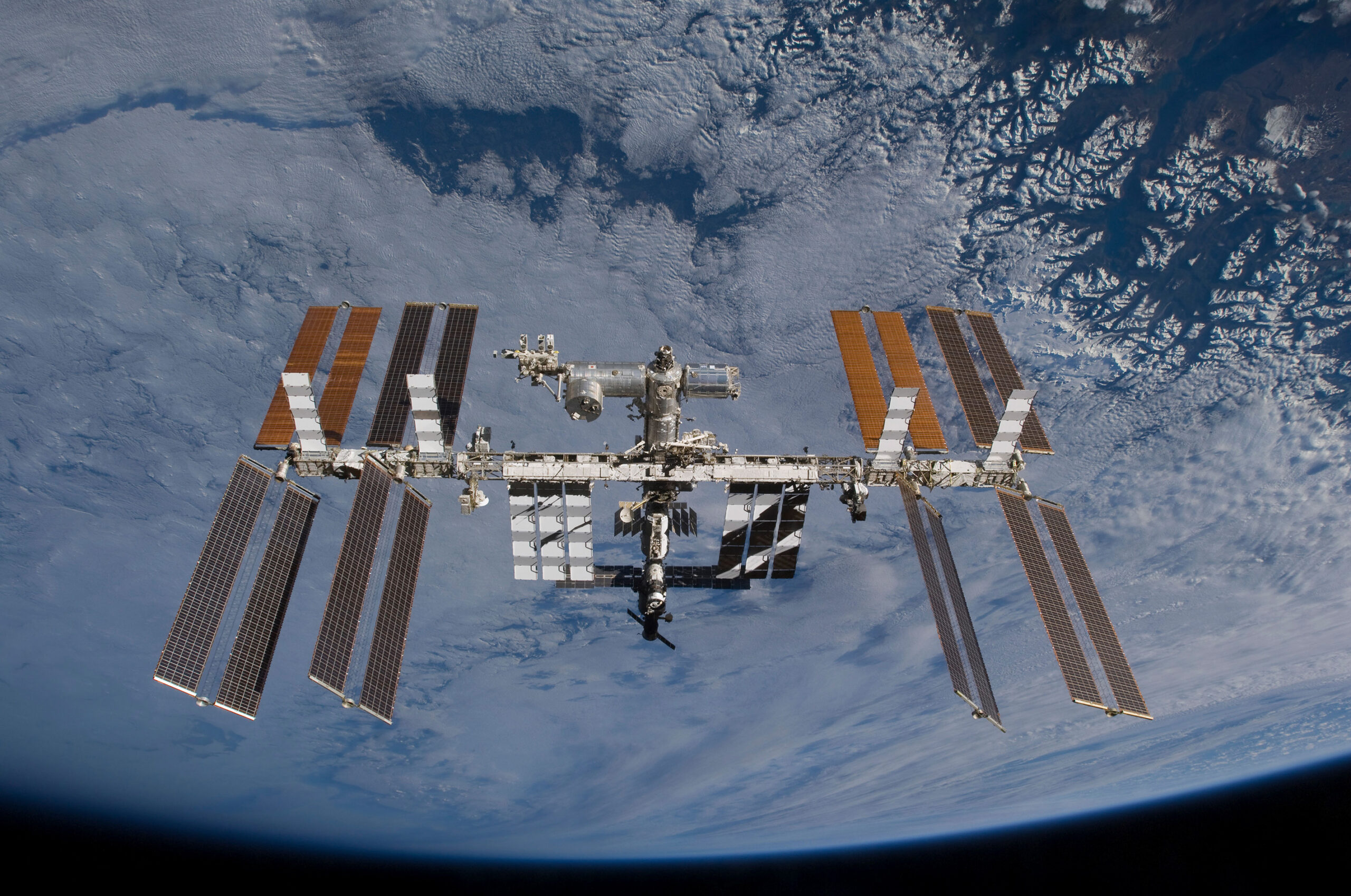 Photographer captures a ‘once-in-a-lifetime image’ of astronauts spacewalking outside the ISS