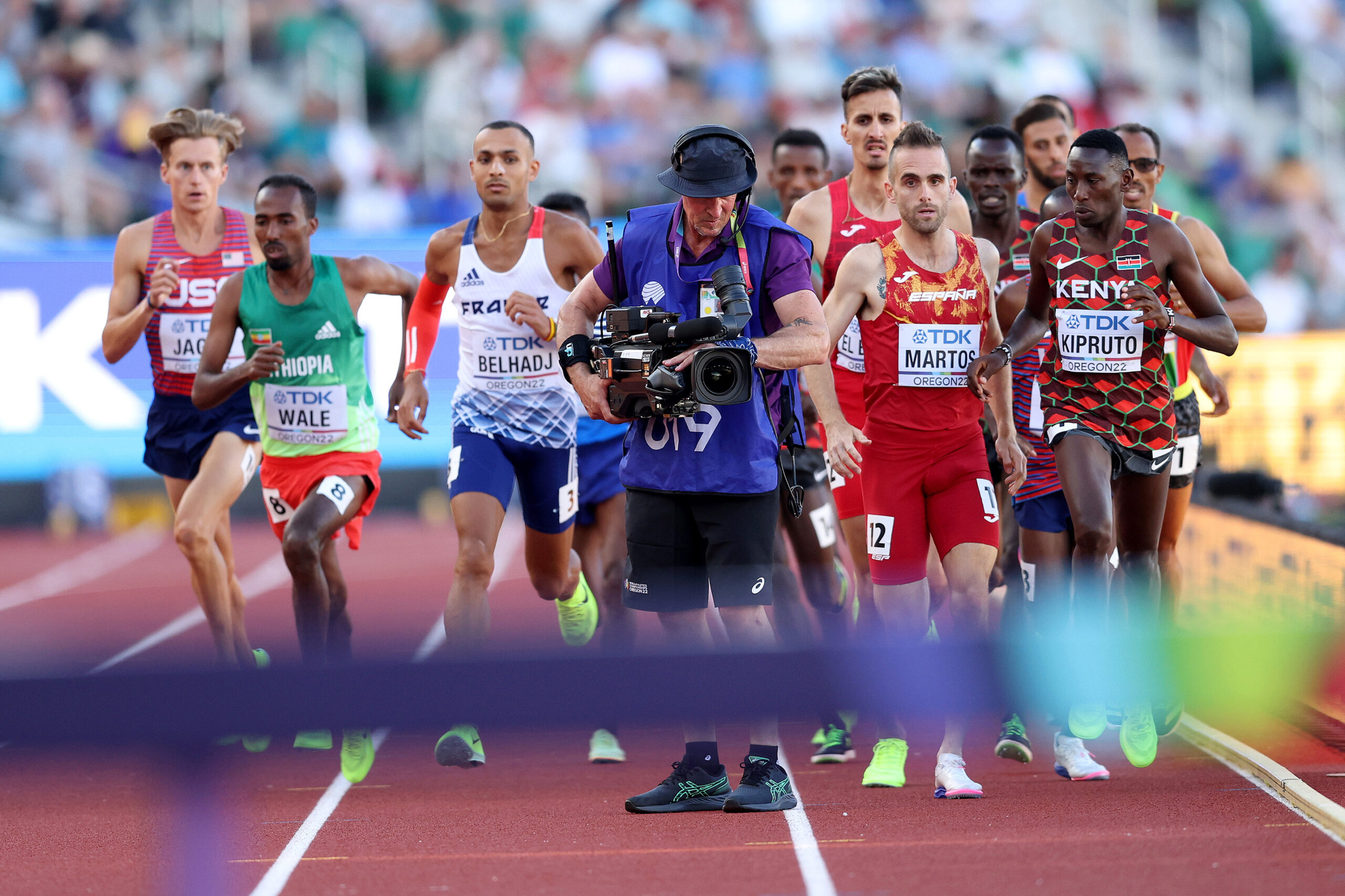 Clueless cameraman creates comedy, calamity during championship track & field event